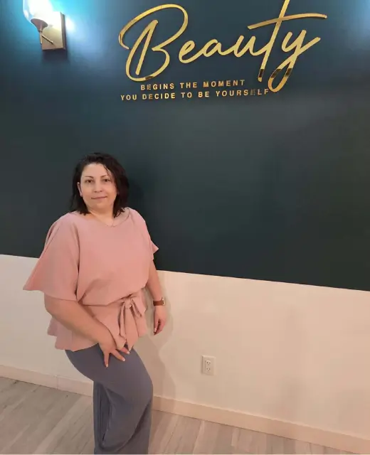 Experienced manicure specialist in Winnipeg performing nail service in a clean salon environment